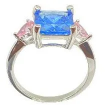 Classic Light Blue Sapphire With Pink Sapphire Side Stones