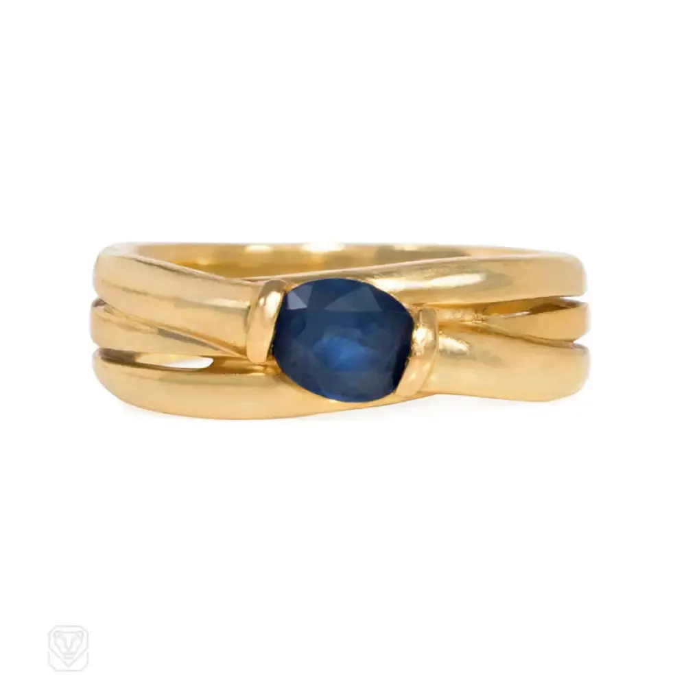 Gold and sapphire wrapped ring, France