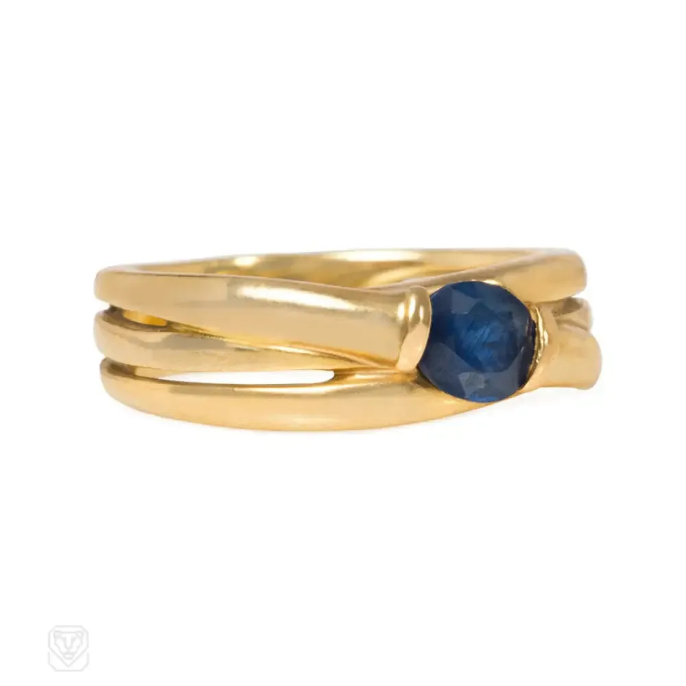 Gold and sapphire wrapped ring, France