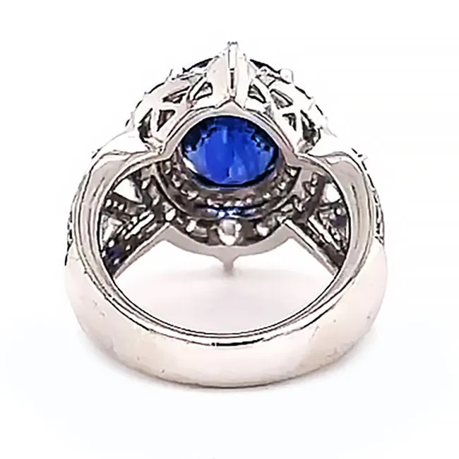 Platinum engagement ring with 7.5 ct blue Sapphire and diamonds. Call for price.