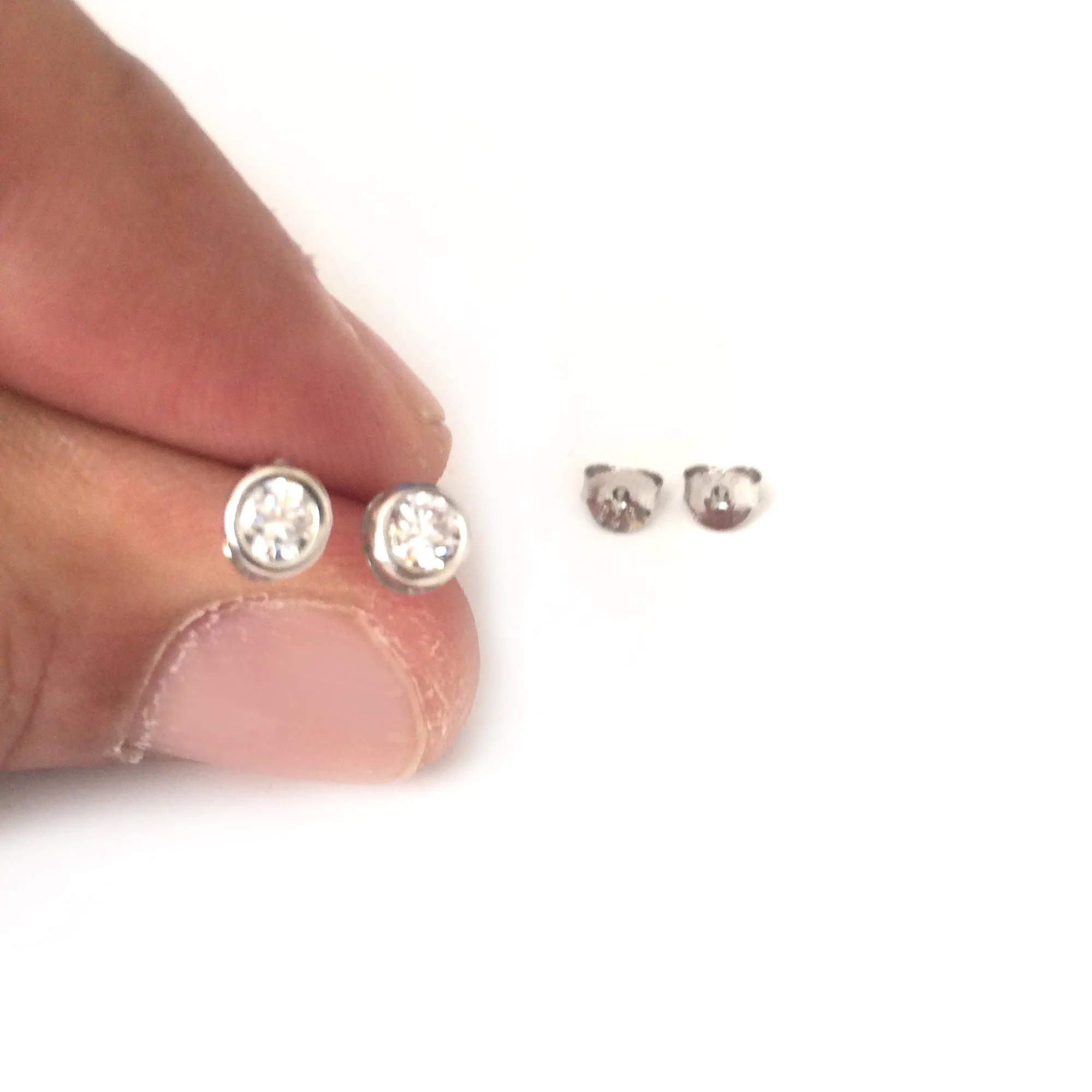 Sterling Silver Rhodium Finish Round Bezel Set Cubic Zirconia Stud Earring